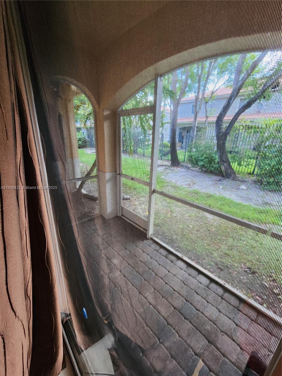 Miramar Miramar, FL 33025 - Photo 11 of 37 a view of outdoor space with balcony and windows