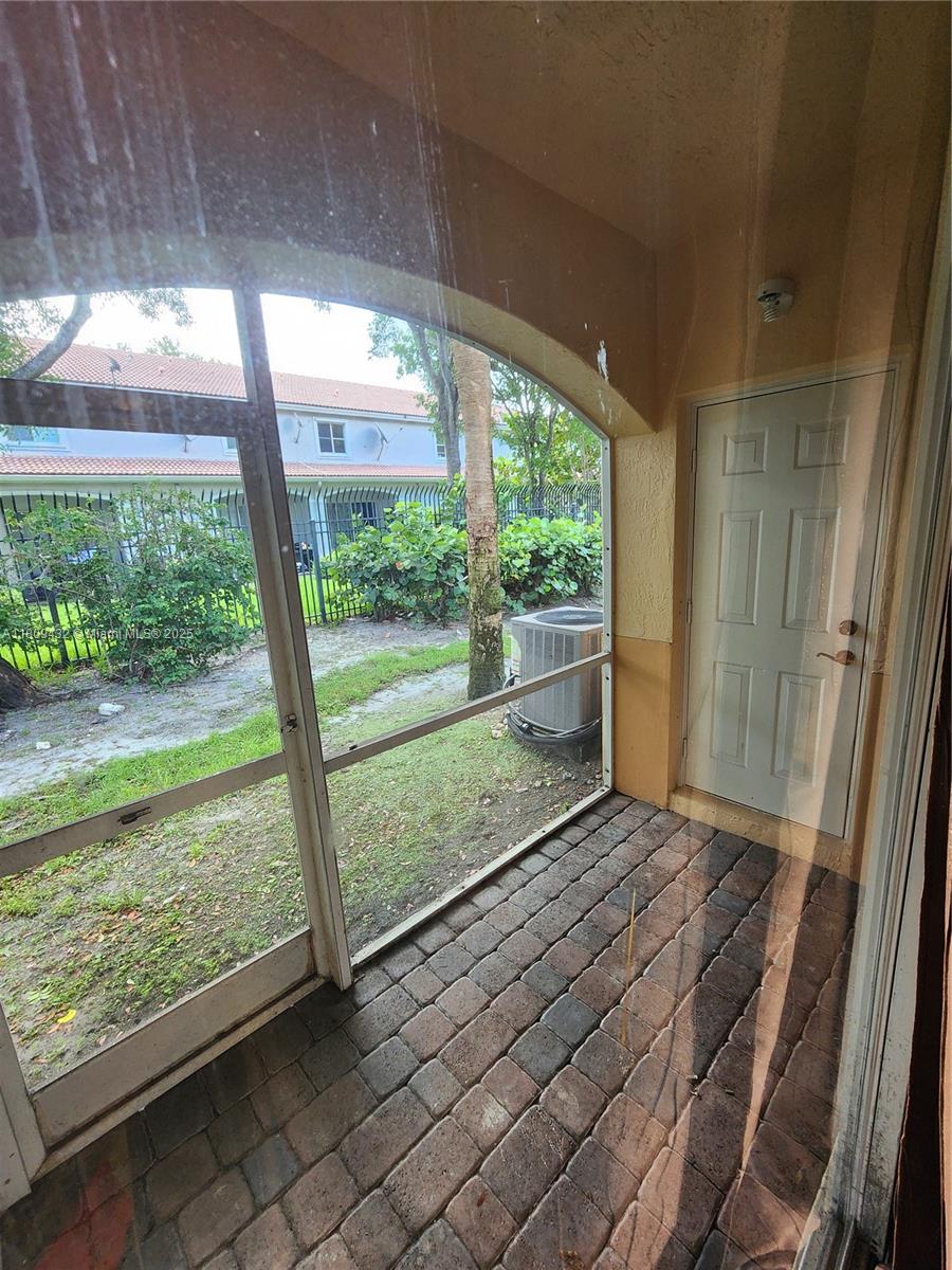 Miramar Miramar, FL 33025 - Photo 12 of 37 a view of a room with wooden floor and outdoor space