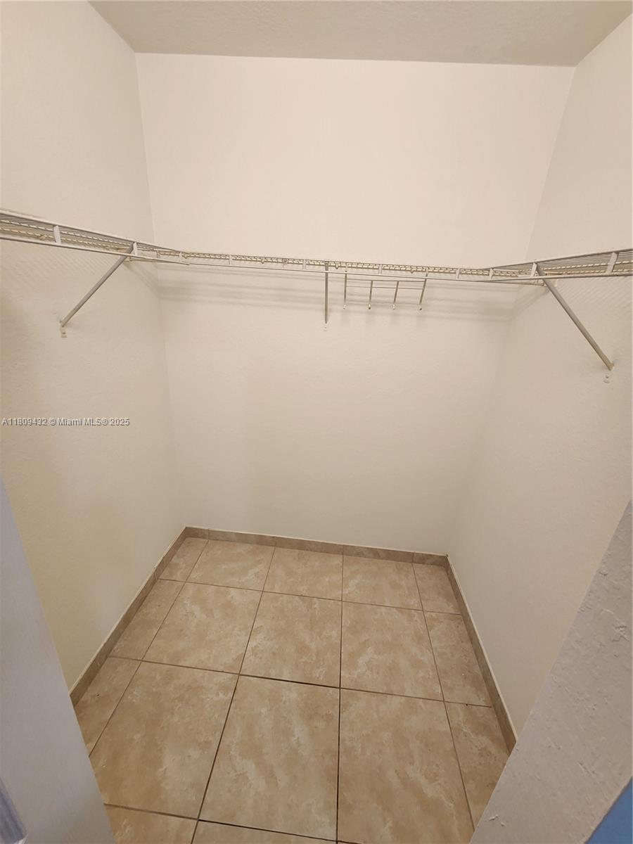 Miramar Miramar, FL 33025 - Photo 19 of 37 a view of a room with racks on the wall