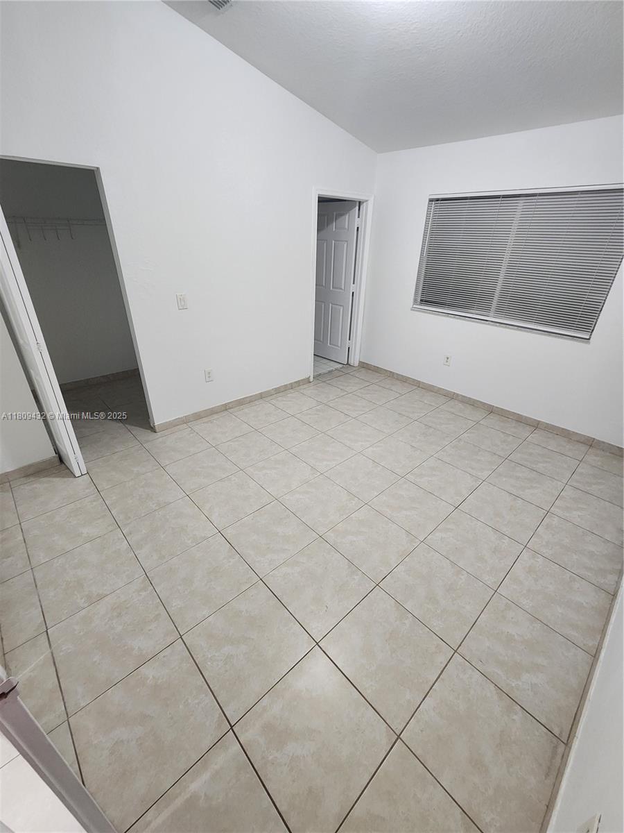 Miramar Miramar, FL 33025 - Photo 26 of 37 a view of an empty room with a window