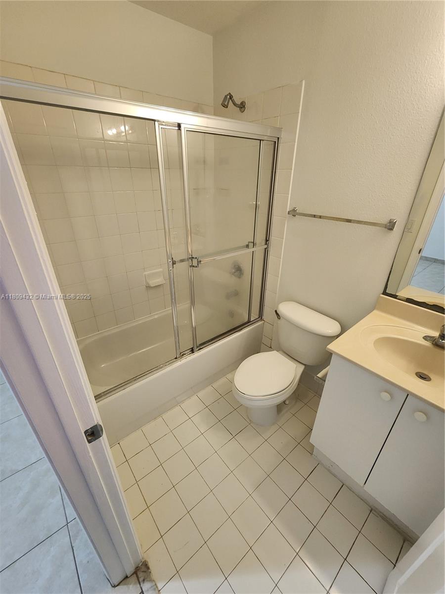 Miramar Miramar, FL 33025 - Photo 30 of 37 a bathroom with a sink and a mirror