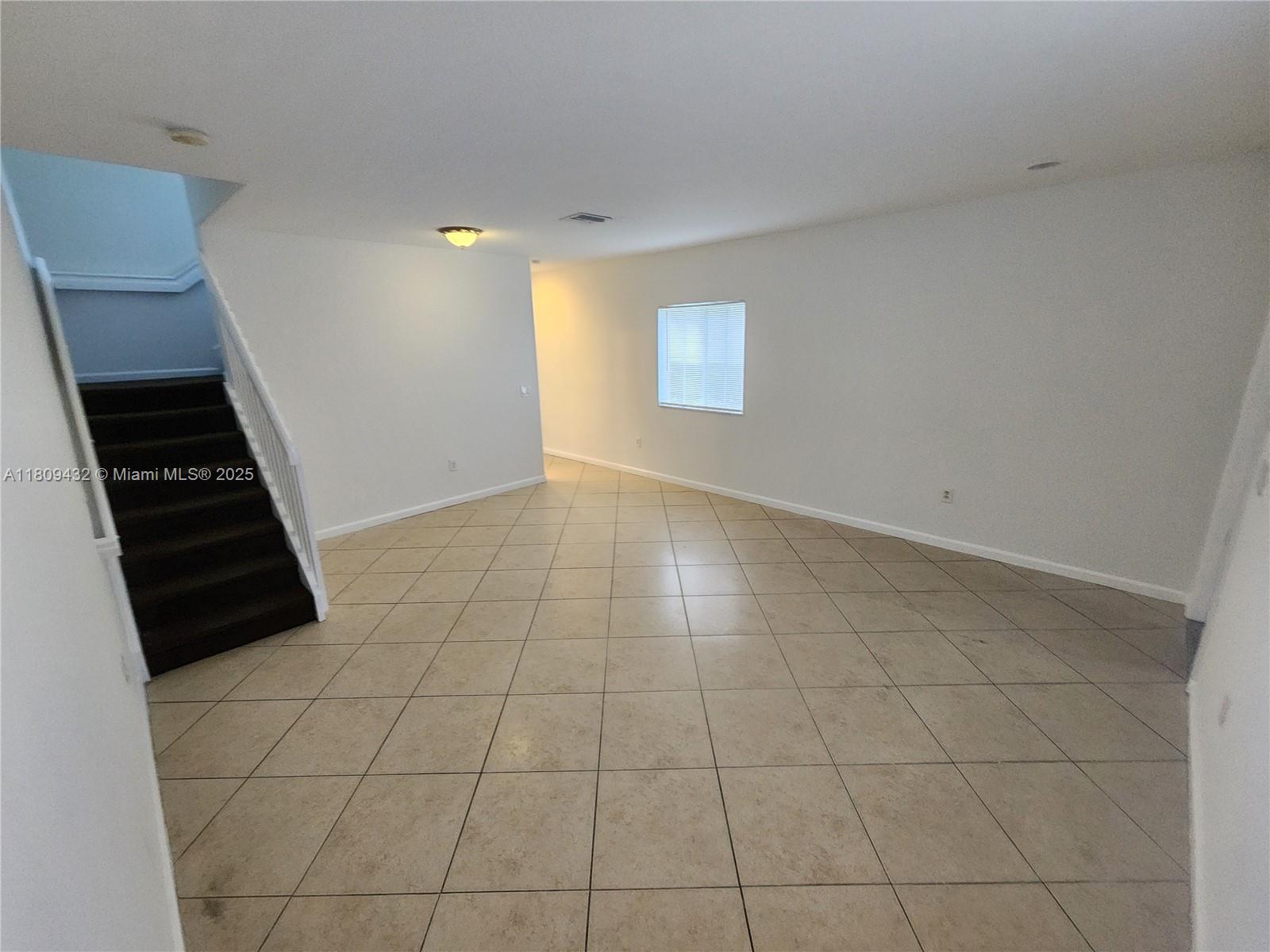 Miramar Miramar, FL 33025 - Photo 34 of 37 a view of an empty room with a window