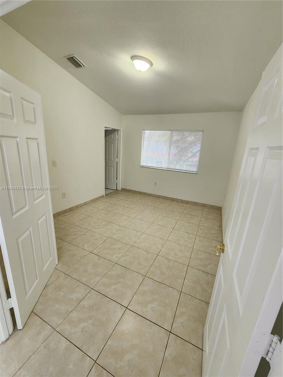 Miramar Miramar, FL 33025 - Photo 9 of 37 an empty room with windows