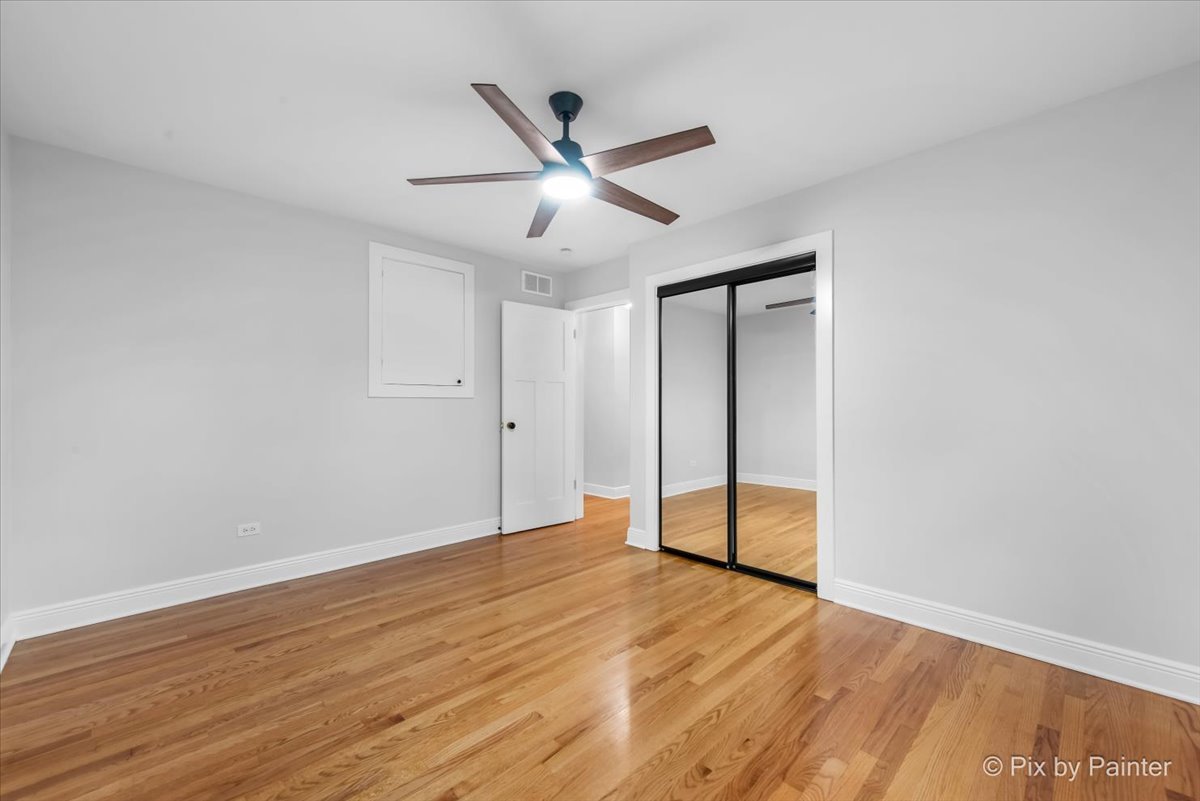 918 Delles Road Wheaton, IL 60189 - Photo 18 of 36 a view of an empty room with wooden floor