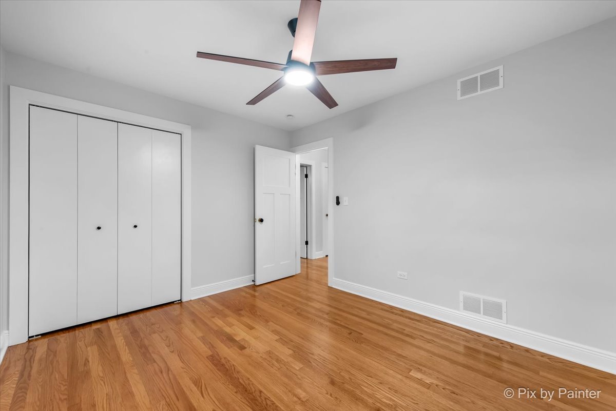 918 Delles Road Wheaton, IL 60189 - Photo 20 of 36 a view of an empty room with wooden floor