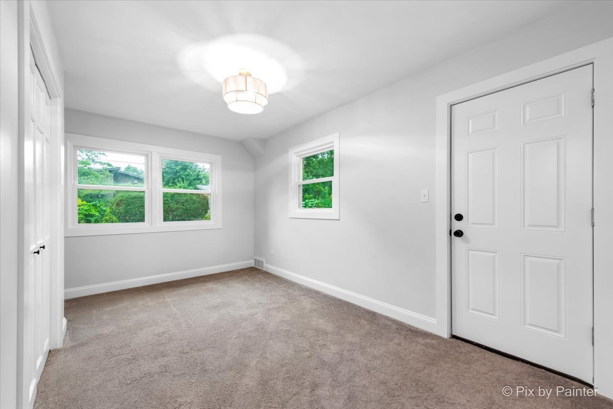 918 Delles Road Wheaton, IL 60189 - Photo 23 of 36 a view of an empty room with a window