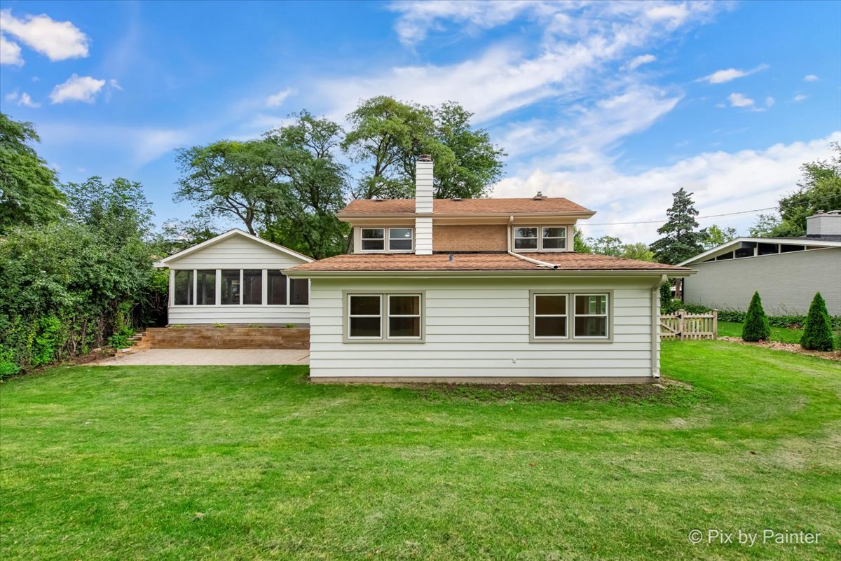 918 Delles Road Wheaton, IL 60189 - Photo 34 of 36 a view of a house with a yard