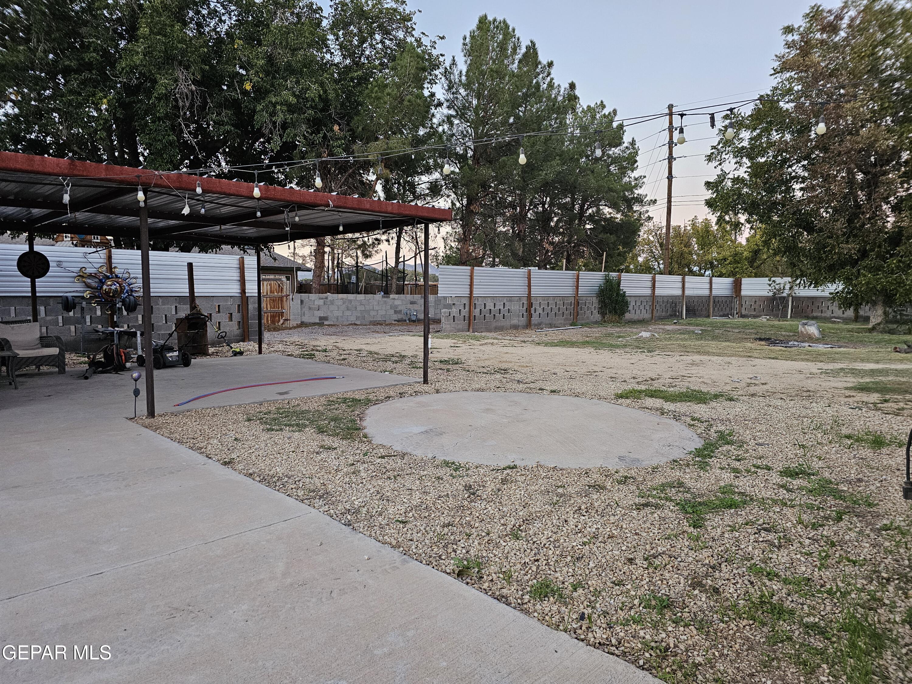1400 San Andres Drive Las Cruces, NM 88007 - Photo 35 of 47 a view of a backyard with sitting area