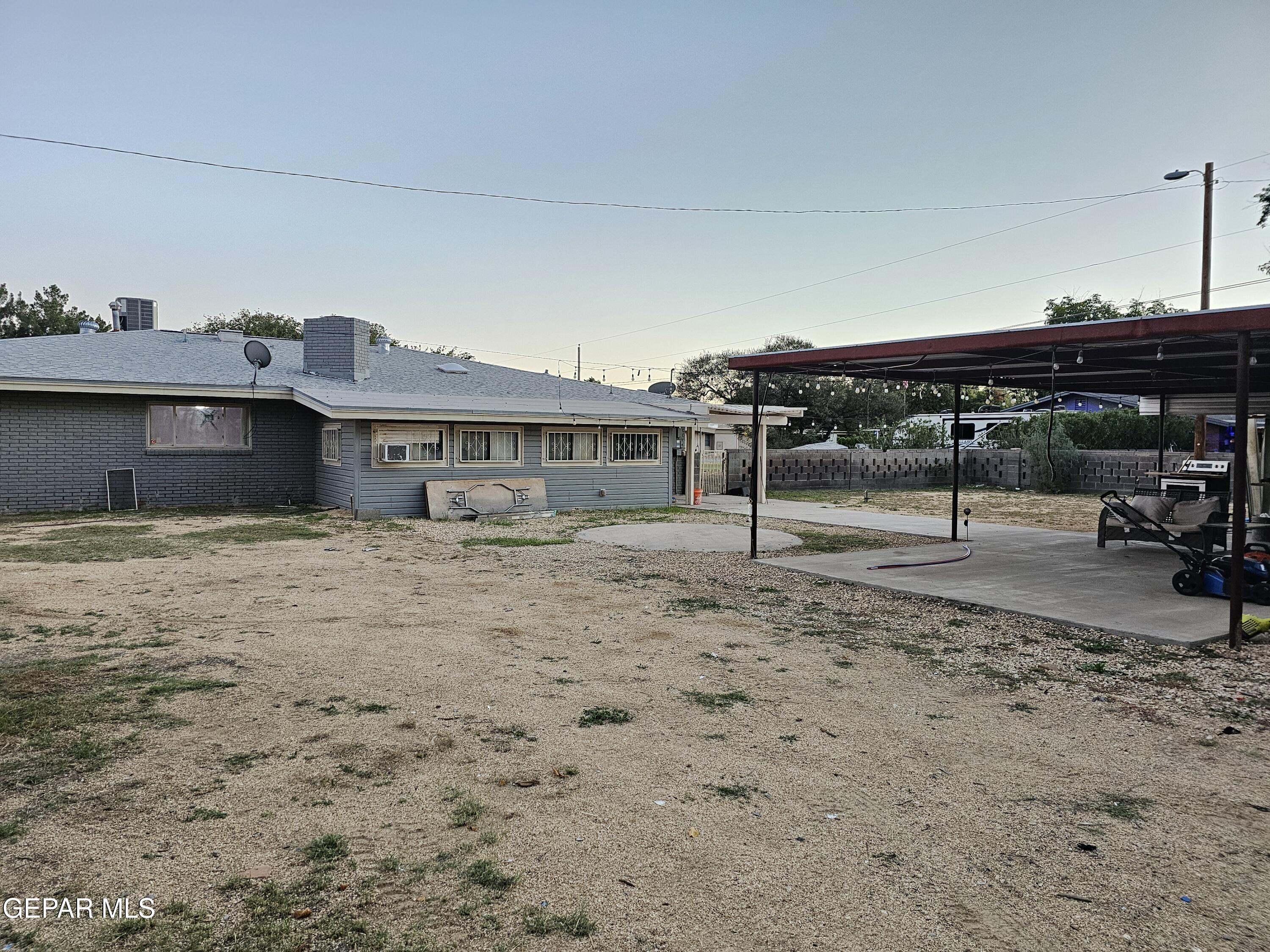 1400 San Andres Drive Las Cruces, NM 88007 - Photo 37 of 47 a front view of a house with a garden