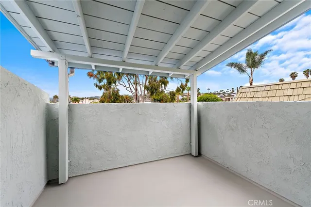 a view of a room with wooden walls