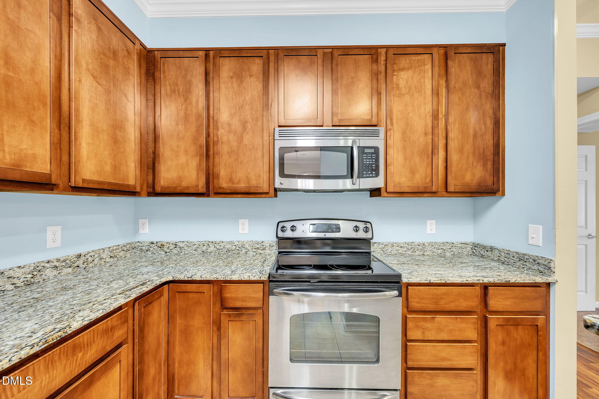 522 Weather Ridge Lane Cary, NC 27513 - Photo 14 of 31 a kitchen with appliances a sink and cabinets