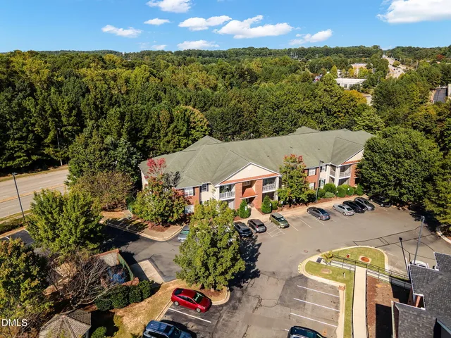 an aerial view of residential houses and outdoor space