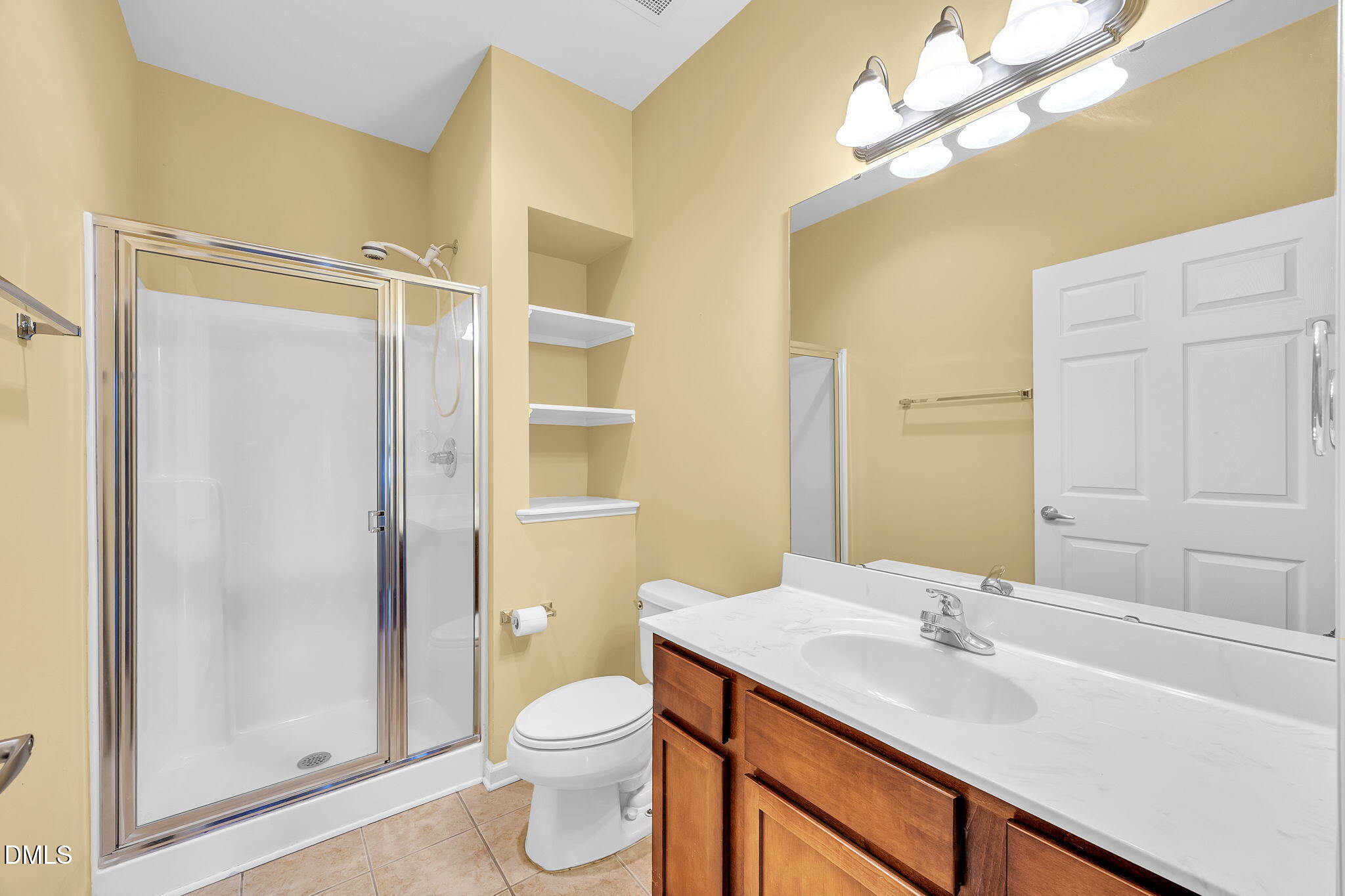 522 Weather Ridge Lane Cary, NC 27513 - Photo 23 of 31 a bathroom with a sink toilet and shower