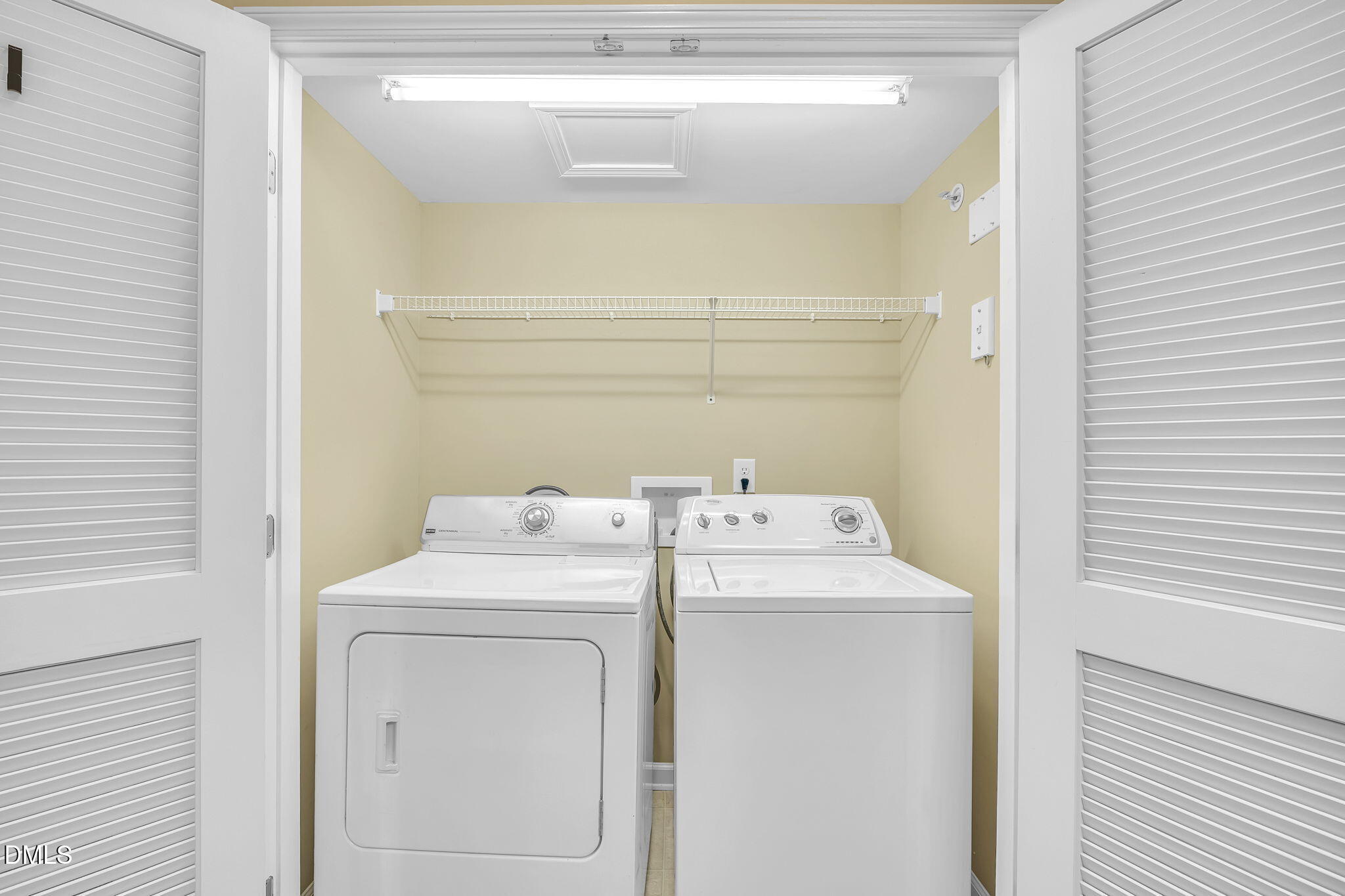 522 Weather Ridge Lane Cary, NC 27513 - Photo 24 of 31 a utility room with dryer and washer