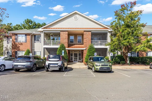 a car parked in front of a house