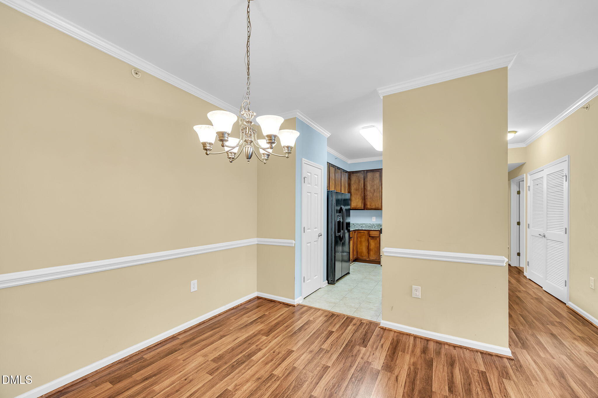 522 Weather Ridge Lane Cary, NC 27513 - Photo 8 of 31 a view of a livingroom with a chandelier