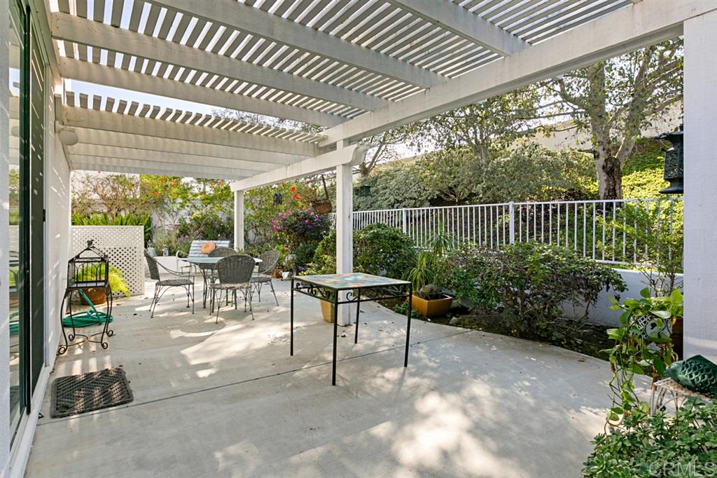 4909 Demeter Way Oceanside, CA 92056 - Photo 22 of 24 Behind the rear patio is a large greenbelt area with no neighbors behind you.