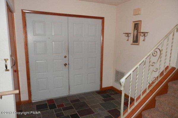 6 Cedar Road Mount Pocono, PA 18344 - Photo 2 of 18 a view of an entryway with staircase
