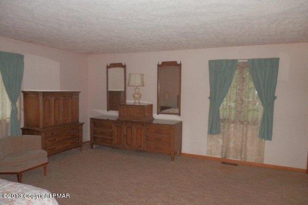 6 Cedar Road Mount Pocono, PA 18344 - Photo 10 of 18 a room with furniture and window