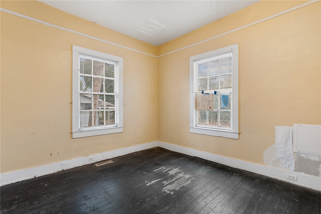 503 Hayes Street Anderson, SC 29624 - Photo 17 of 23 This bright room features beautiful windows and durable flooring, offering a versatile space.
