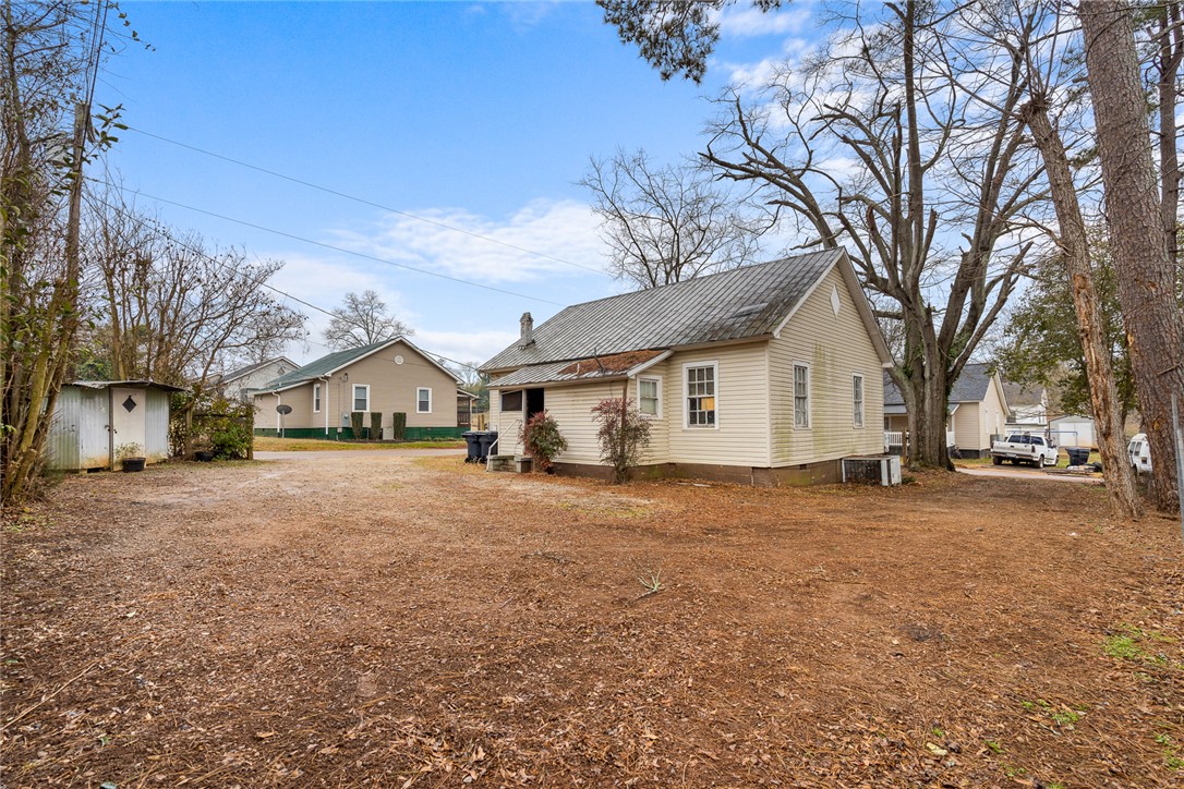 503 Hayes Street Anderson, SC 29624 - Photo 19 of 23 This property features a spacious yard and classic siding, offering a cozy and inviting atmosphere.
