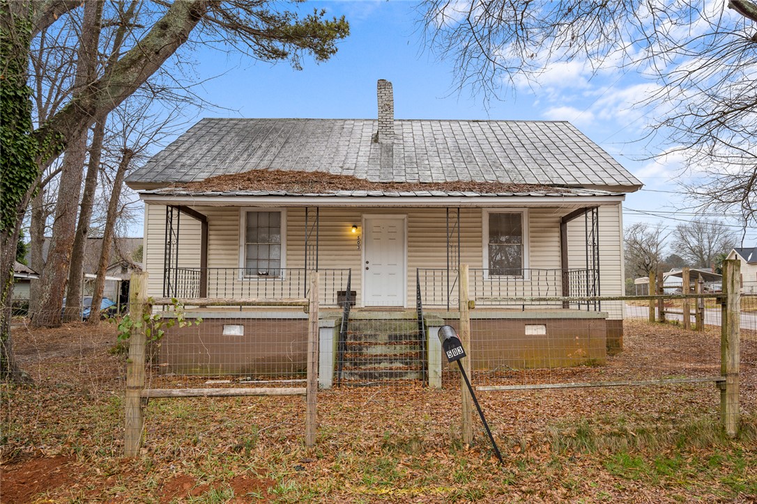 503 Hayes Street Anderson, SC 29624 - Photo 2 of 23 This classic bungalow offers a welcoming porch, a timeless facade, and a rustic fence for added charm.