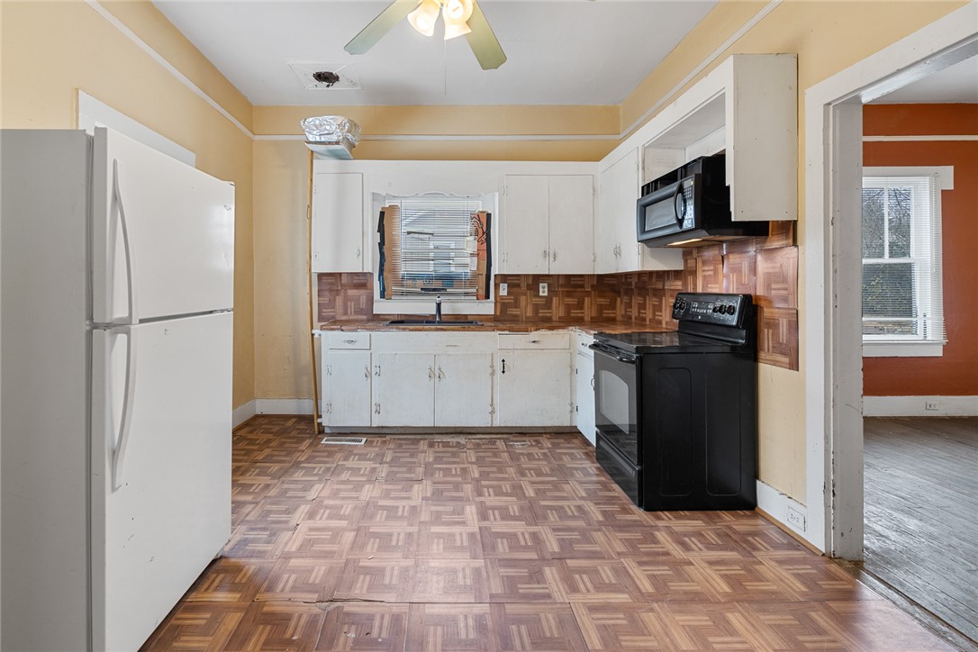 503 Hayes Street Anderson, SC 29624 - Photo 9 of 23 This spacious kitchen offers ample room for culinary endeavors and everyday living.