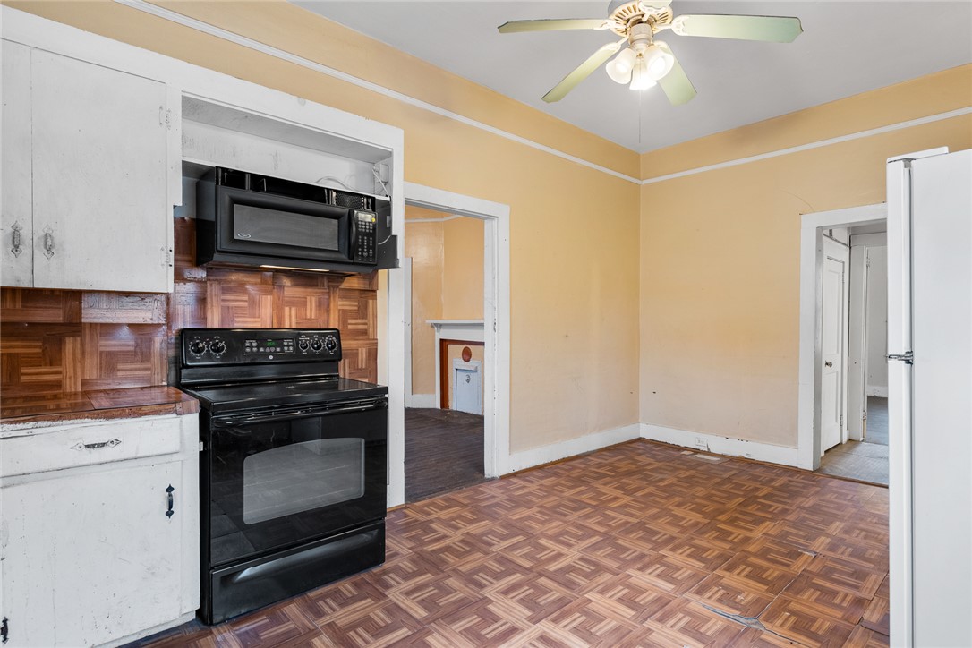 503 Hayes Street Anderson, SC 29624 - Photo 10 of 23 This spacious kitchen offers ample potential with existing appliances and durable flooring.