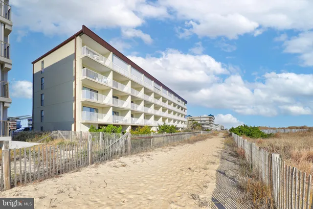 a picture of a bench in front of a door