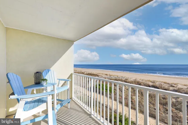 a view of balcony with furniture