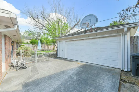 a view of a house with a backyard and windows