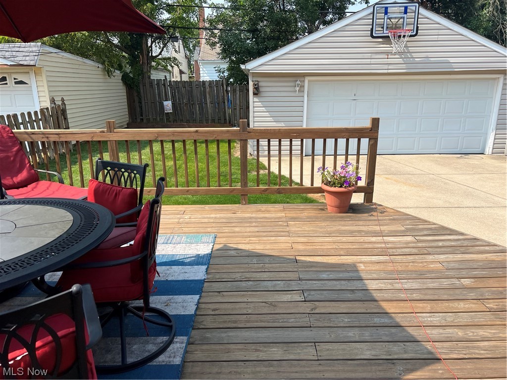 11817 Crofton Road Garfield Heights, OH 44125 - Photo 3 of 3 Wooden deck with garage