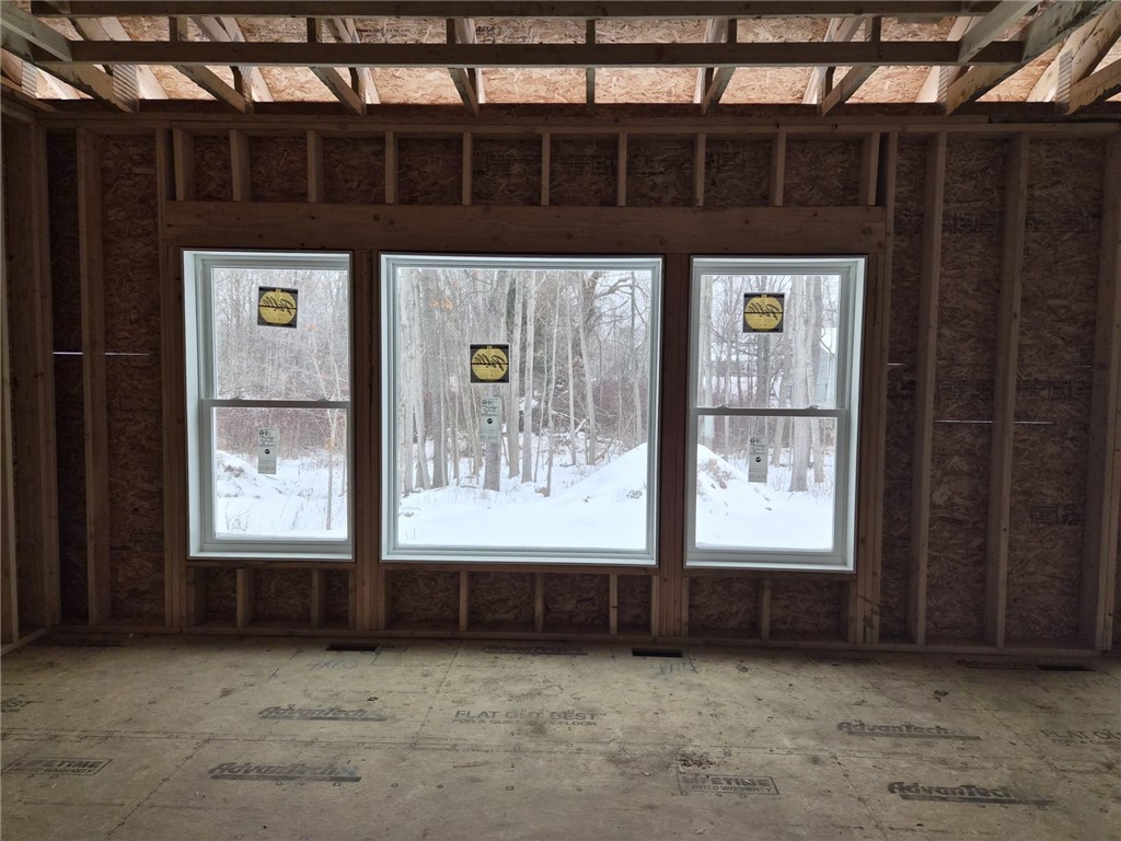 7078 Ontario Center Road Ontario, NY 14519 - Photo 4 of 7 great room to back yard - and Pella Windows!