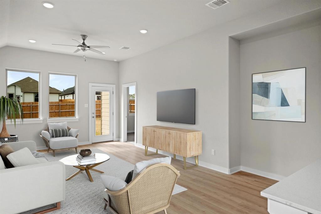 844 Sunflower Road Lavon, TX 75166 - Photo 7 of 24 Living Room in the Birch home plan by Trophy Signature Homes – REPRESENTATIVE PHOTO