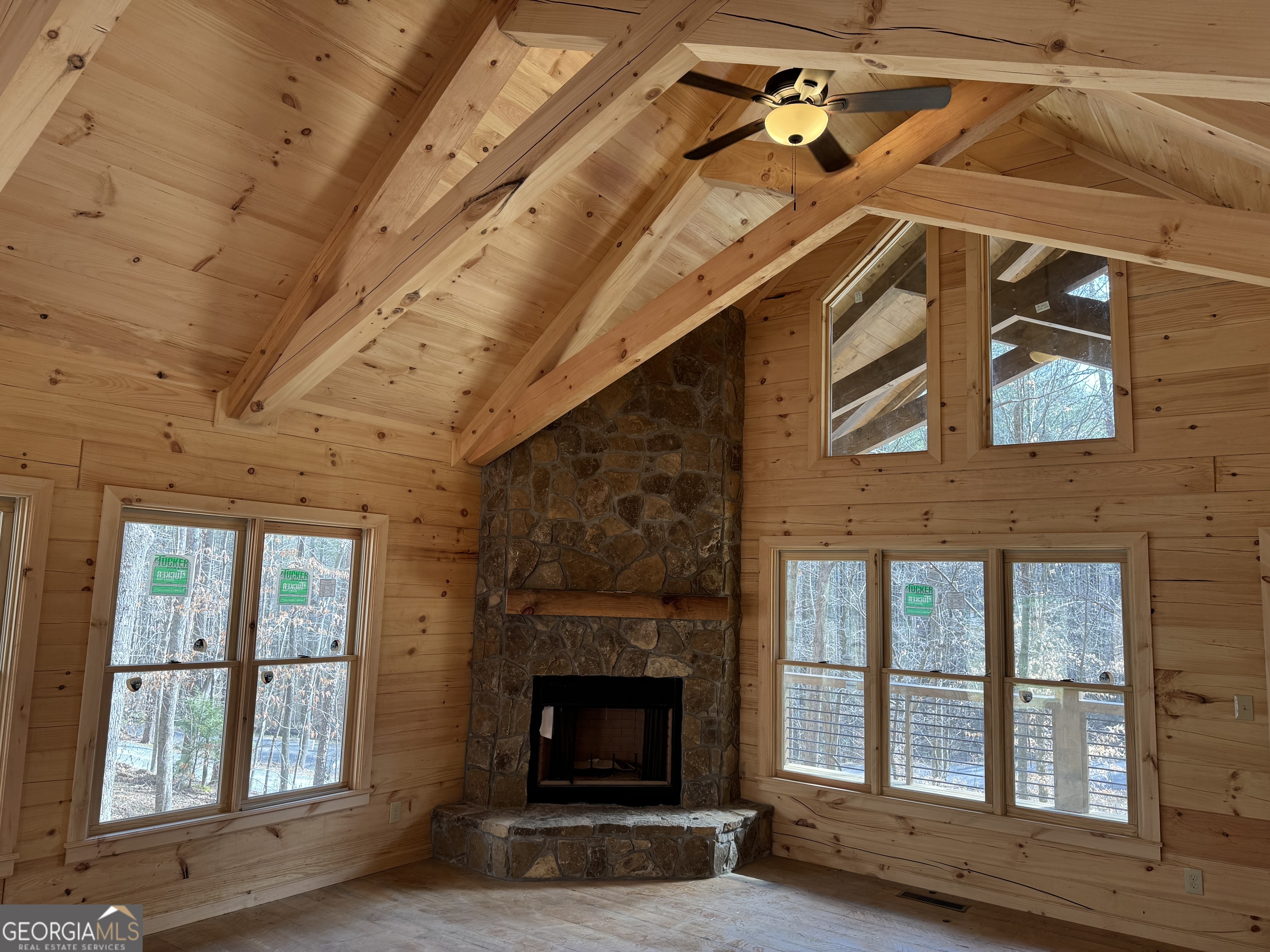 639 Moreland Drive Blue Ridge, GA 30522 - Photo 11 of 24 a living room with furniture and a fireplace