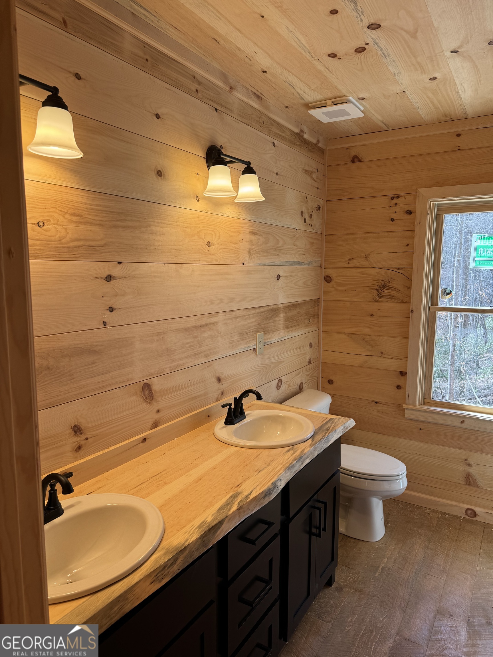 639 Moreland Drive Blue Ridge, GA 30522 - Photo 12 of 24 a bathroom with a sink a toilet and shower