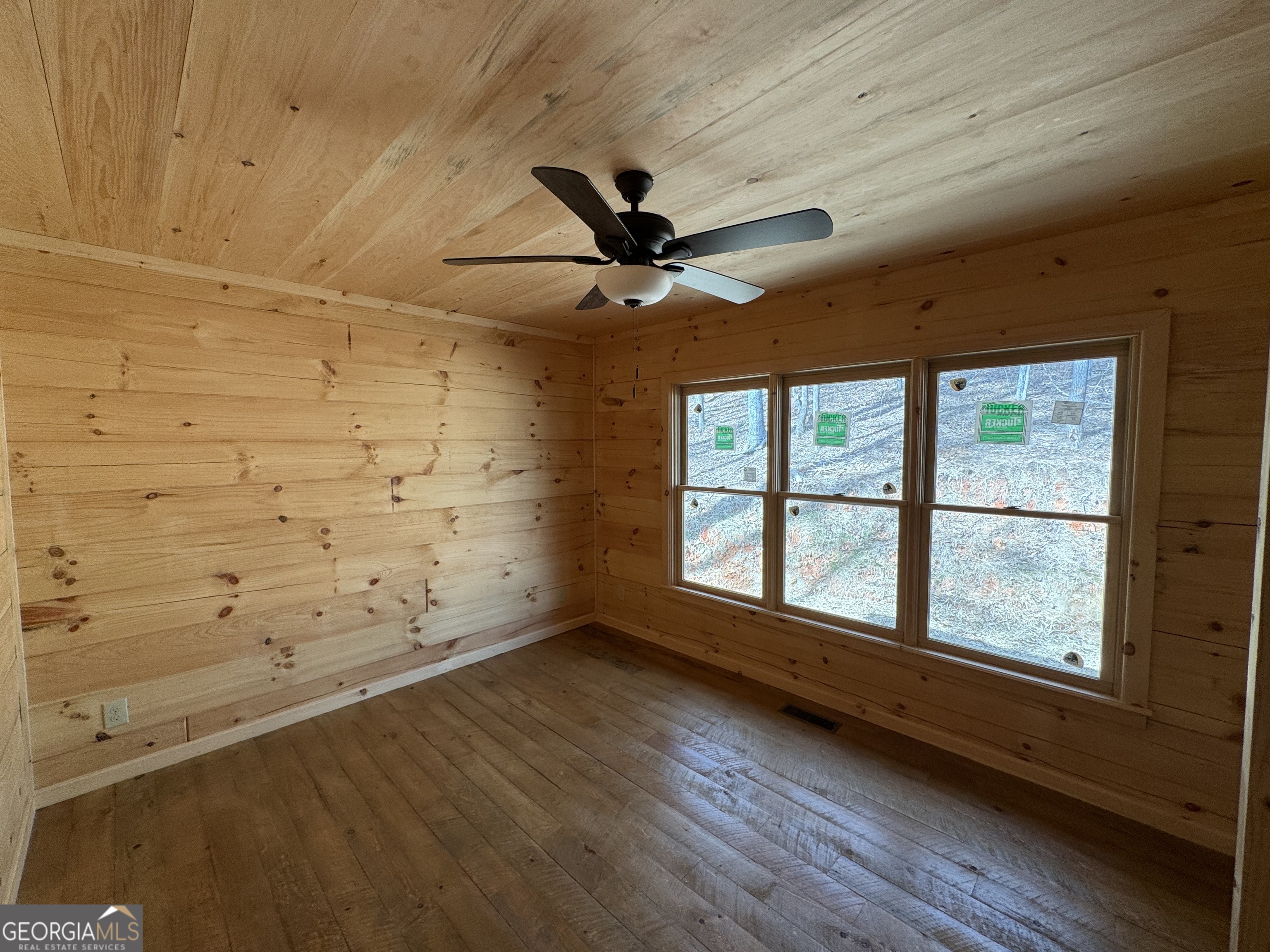 639 Moreland Drive Blue Ridge, GA 30522 - Photo 18 of 24 a view of an empty room with a window