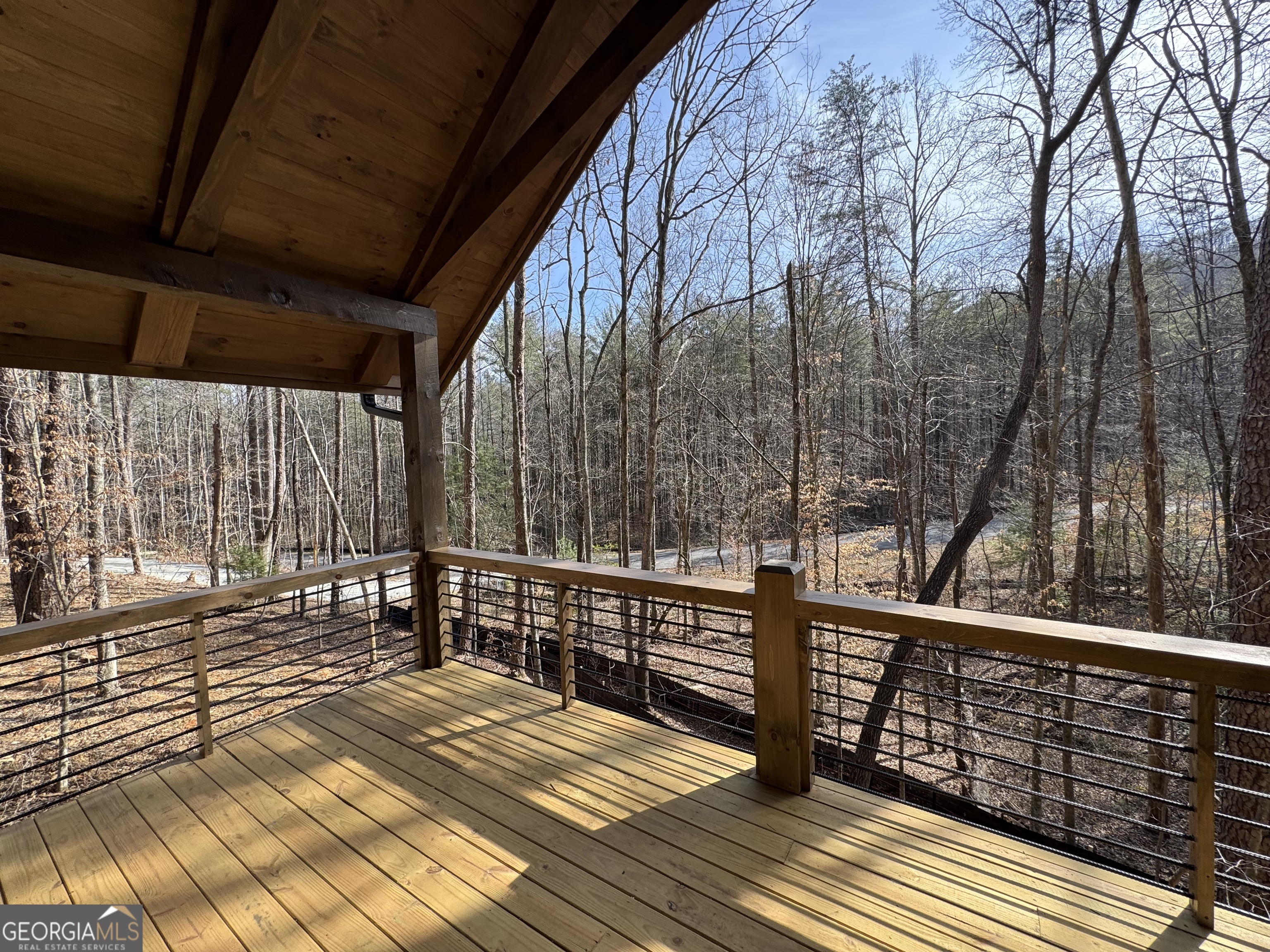 639 Moreland Drive Blue Ridge, GA 30522 - Photo 24 of 24 a view of a balcony with wooden floor