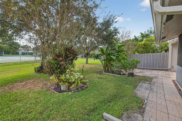 a view of a garden with a slide