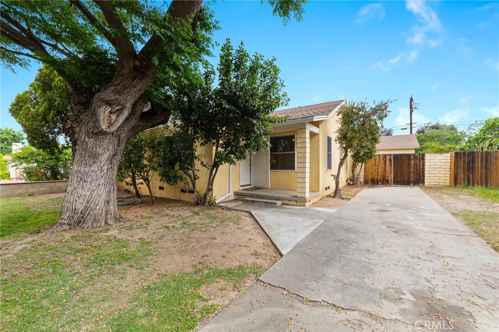 3551 Verde Street Riverside, CA 92504 - Photo 1 of 1 a front view of a house with a yard and garage