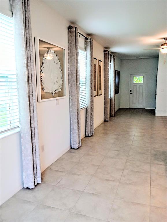 21415 Darter Road Land O' Lakes, FL 34638 - Photo 9 of 27 an empty room with closet and mirror