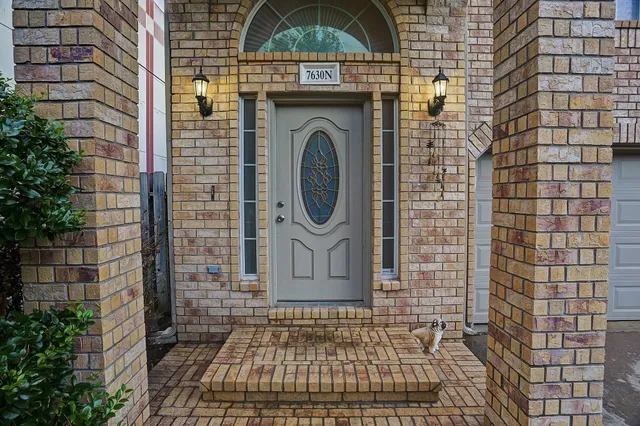 a bathroom with a sink and a shower