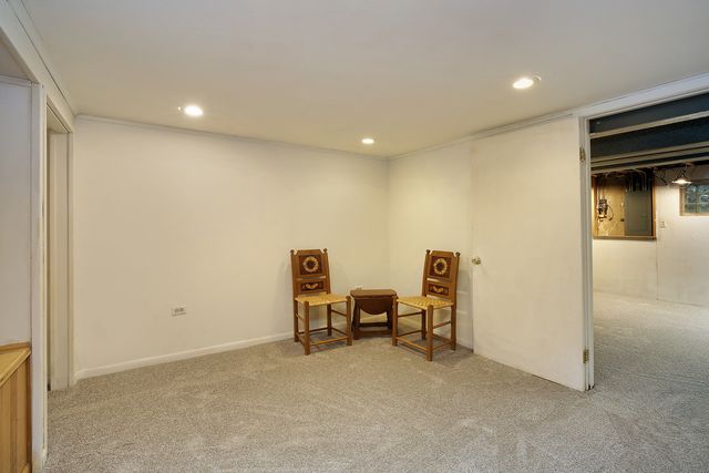 a view of storage and utility room with washer and dryer