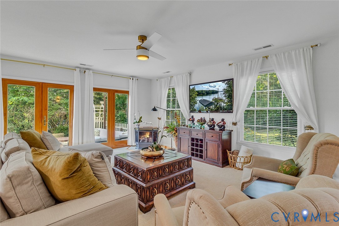 437 Plainview Road Kinsale, VA 22488 - Photo 8 of 50 a living room with furniture and a large window