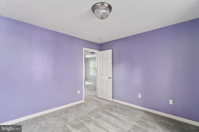 a view of a livingroom with wooden floor