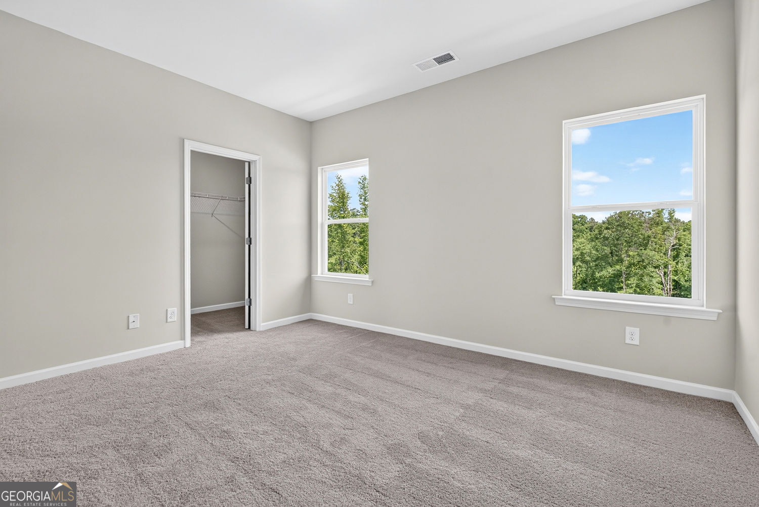 155 Oconee Road, Unit 252 Cartersville, GA 30120 - Photo 20 of 39 an empty room with windows and closet