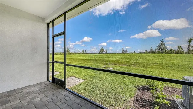 a view of a golf club with a backyard