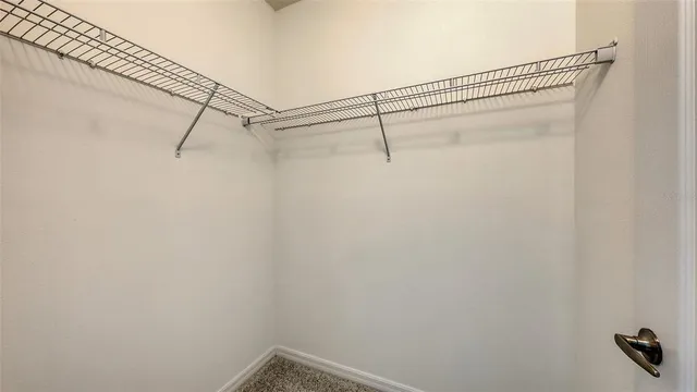 a view of a room with racks on the wall