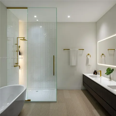 a bathroom with a bathtub and a shower
