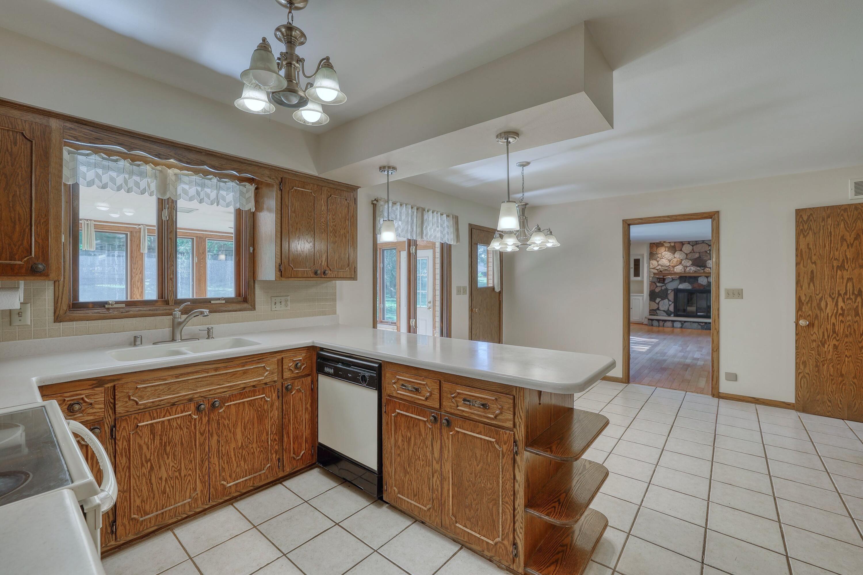 3910 Fresno Road Brookfield, WI 53045 - Photo 7 of 47 Kitchen to Living Room